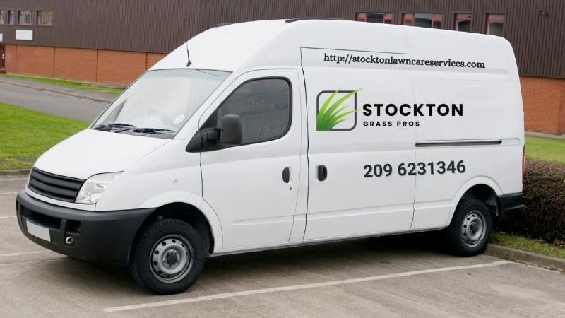 A Stockton Lawn Care van parked on a residential street, featuring the company logo and vibrant green design.